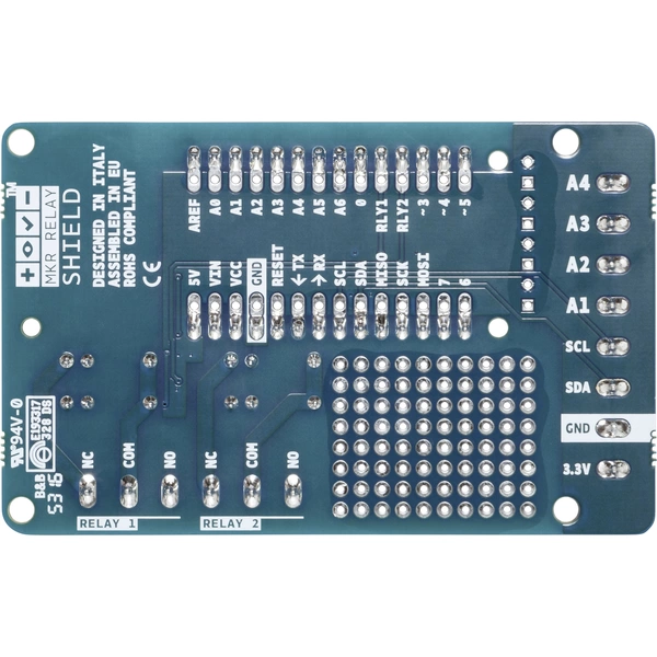 'MRK Relay Shield' auf blauer Platine mit Anschlüssen, Pins und Beschriftungen für elektrische Verbindungen und Steuerungselemente.